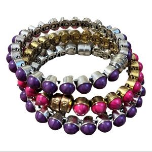 5/$20 Purple and pink plunder bracelets with magnetic clasps set of 3